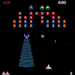A game of Galaga. The player controls a spaceship that is trying to dodge attacks from enemy spaceships. The boss spaceship has a tractor beam that spreads out in front of itself towards the player.